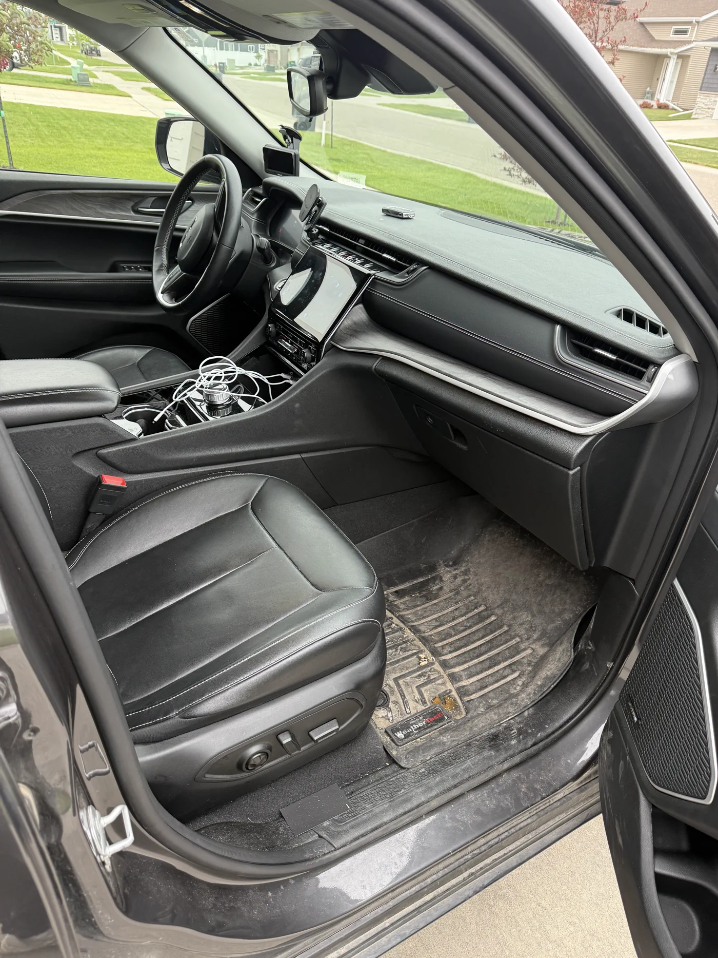 Before: Jeep Grand Cherokee interior — pre-detail.